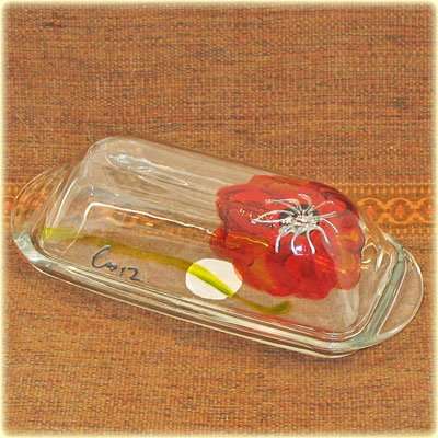 Handpainted red flower on a nice glass butterdish